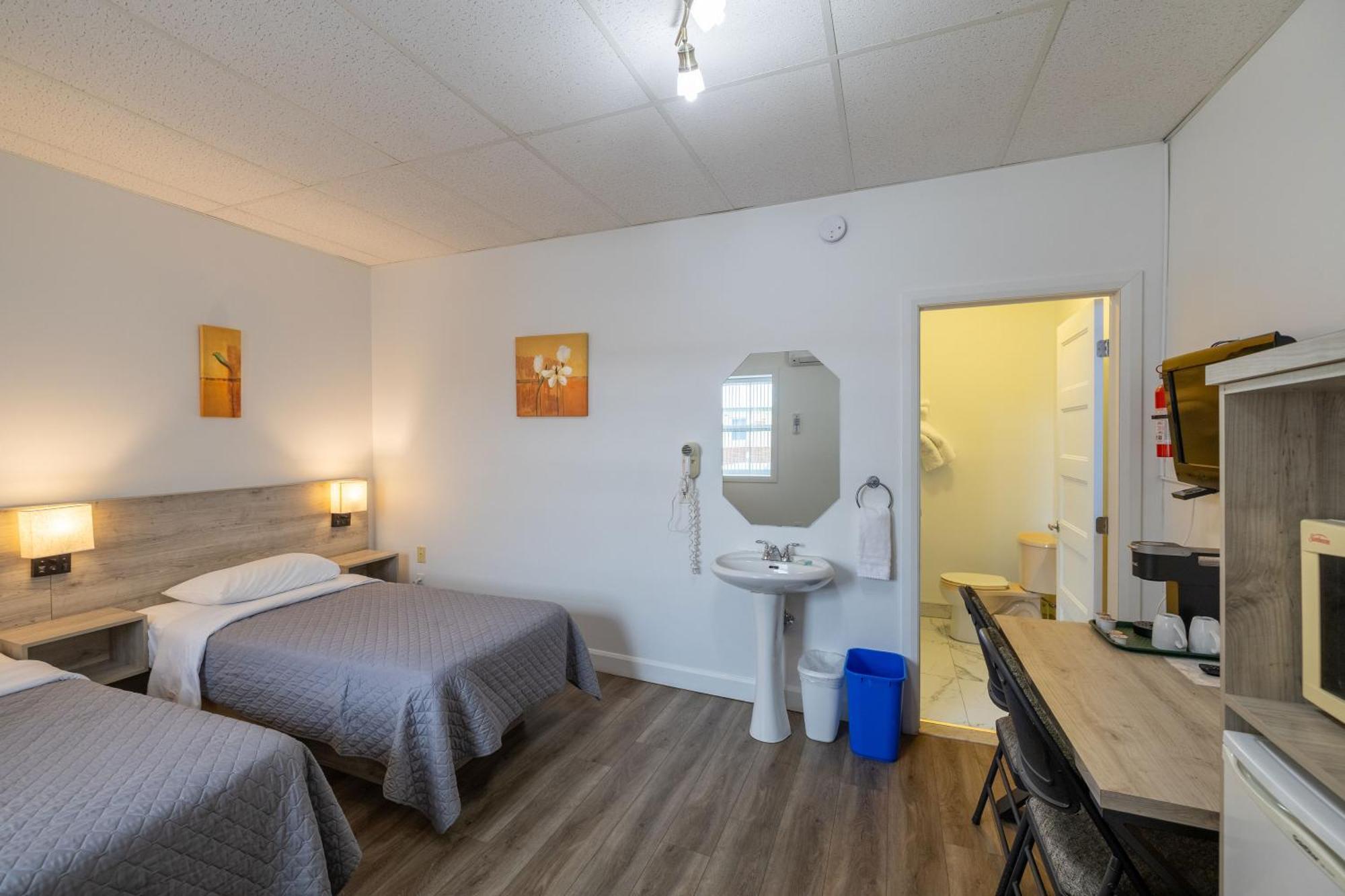 Motel Et Condo Chez Charley Сент-Анн-де-Бопре Экстерьер фото