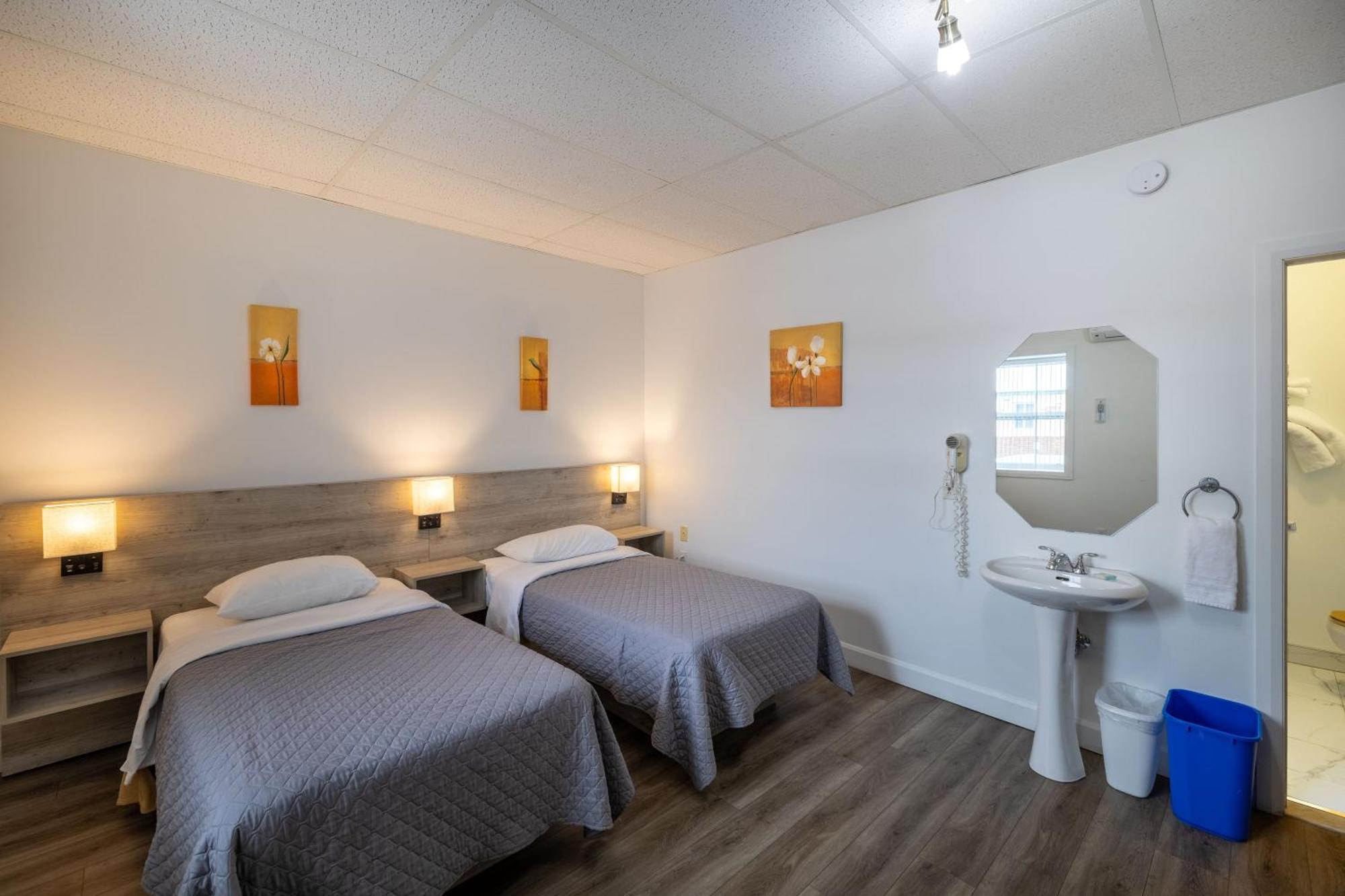 Motel Et Condo Chez Charley Сент-Анн-де-Бопре Экстерьер фото